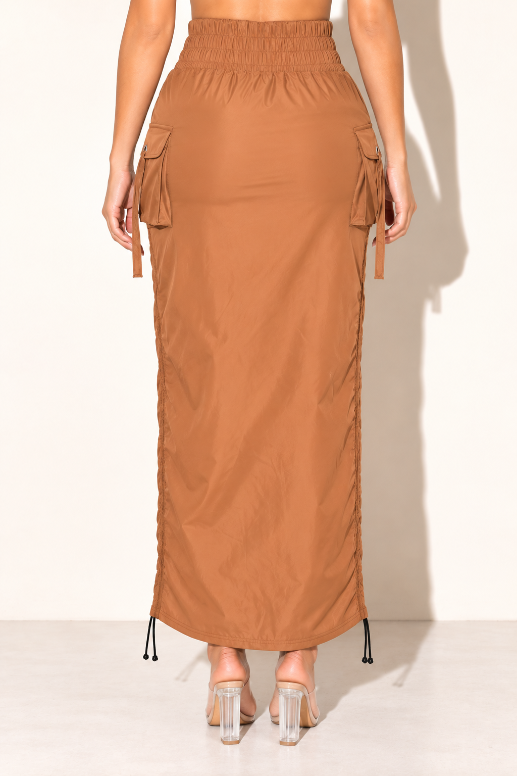 Mocha windbreaker maxi skirt, full-length back view with elastic waistband and side pockets