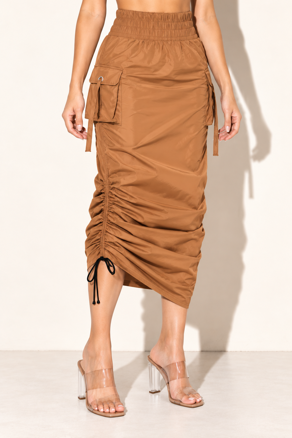 Mocha cargo skirt, front view with side drawstrings gathered to a shorter length