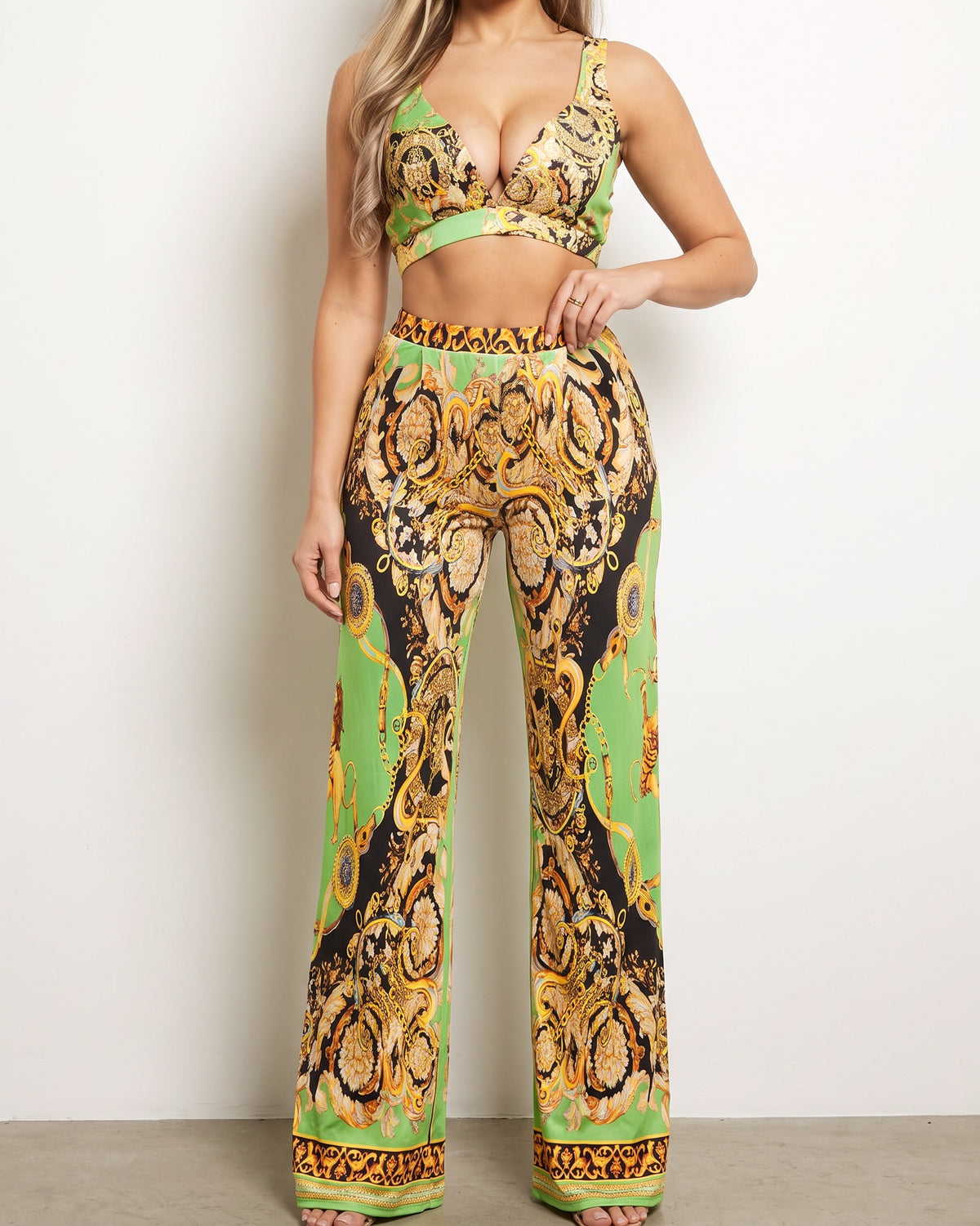 Green combo printed crop top and pants set, alternate front view on model