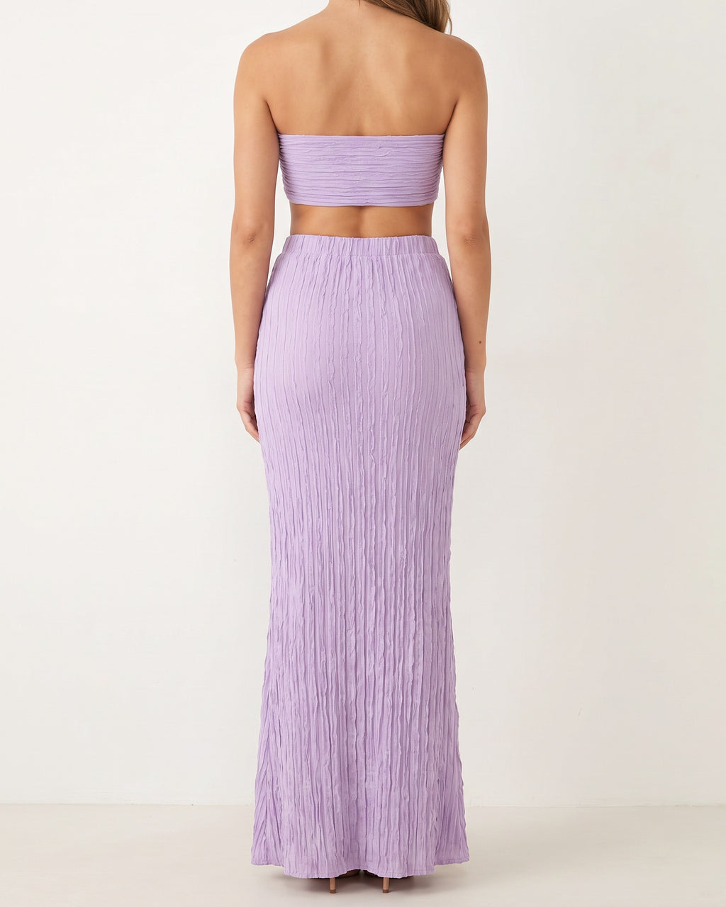 Lavender ruffle designed skirt set, back view on model