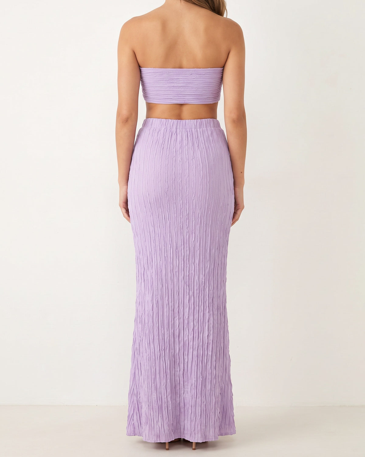 Lavender ruffle designed skirt set, back view on model
