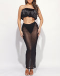 Muvin women's black ruffled top and maxi skirt set, front view on model