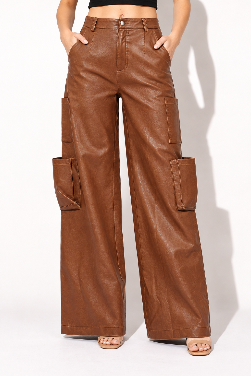 Muvin women's brown faux leather wide leg utility pants, front view showing button waist and open side patch pockets