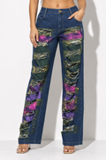 Muvin women's distressed denim pants, front view on model