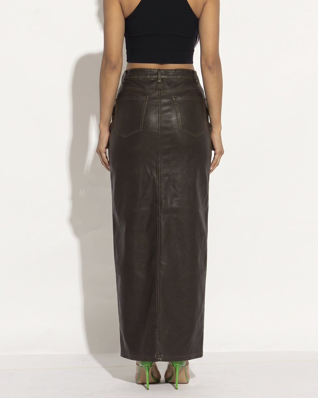 Brown thigh slit maxi skirt, back view on model