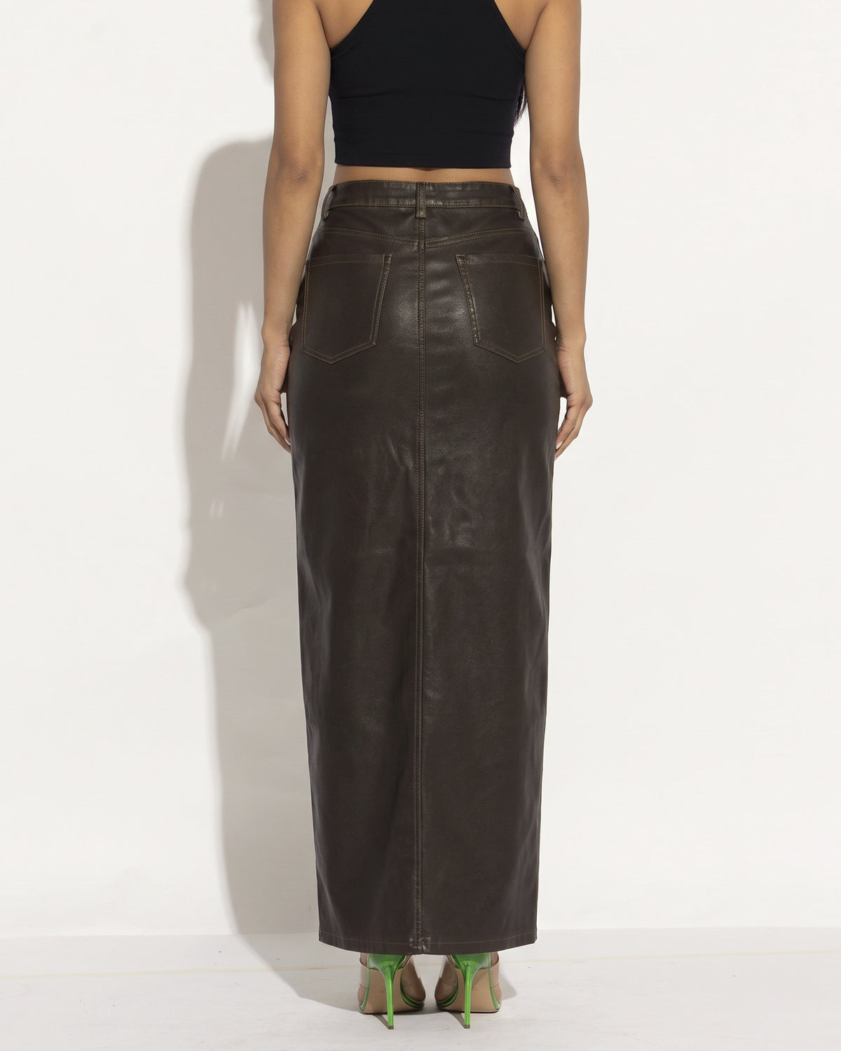 Brown thigh slit maxi skirt, back view on model
