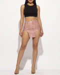 Muvin women's pink washed faux leather mini skirt, front view on model