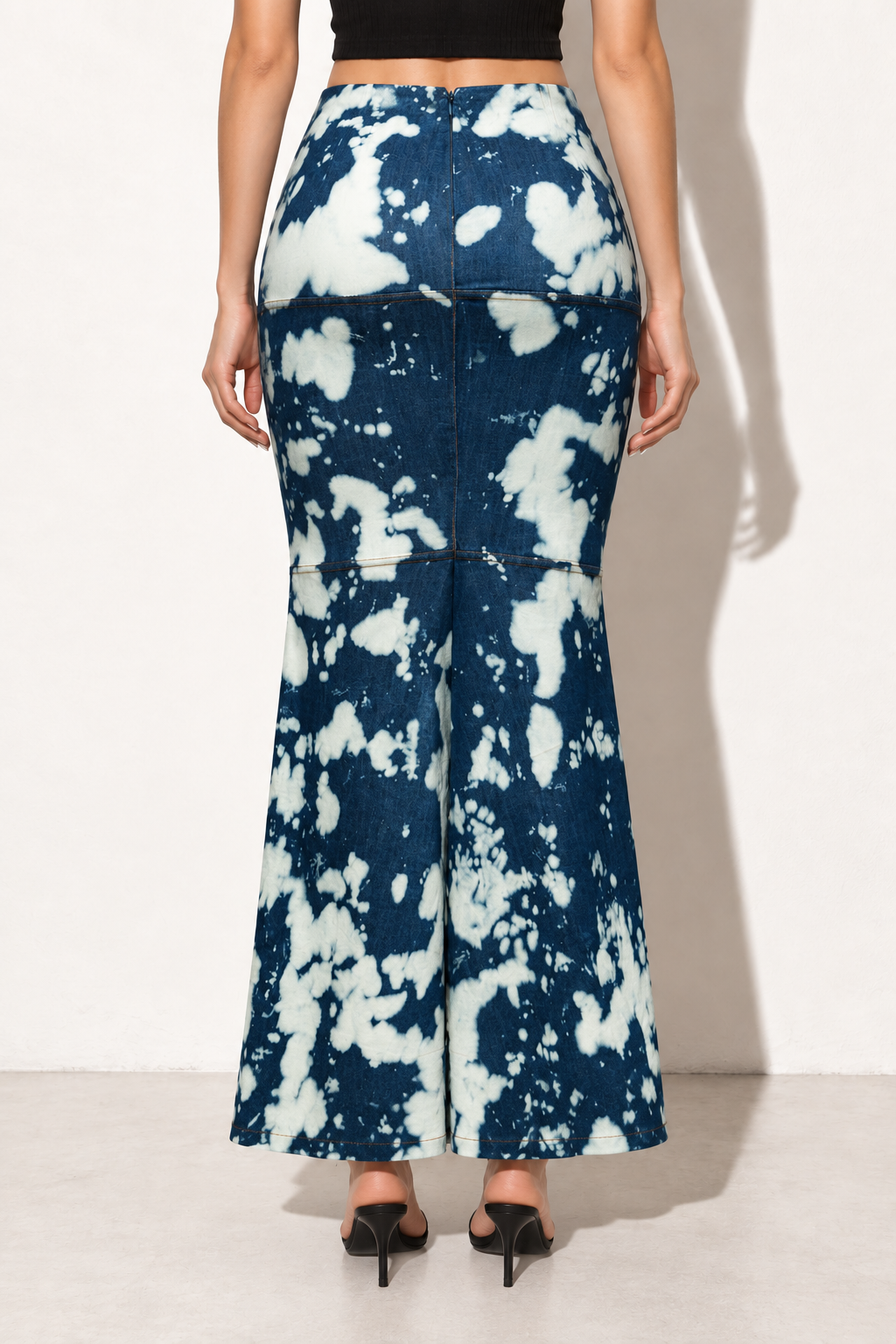 Acid wash indigo and cream denim mermaid maxi skirt, back view showing rear zipper and center seam