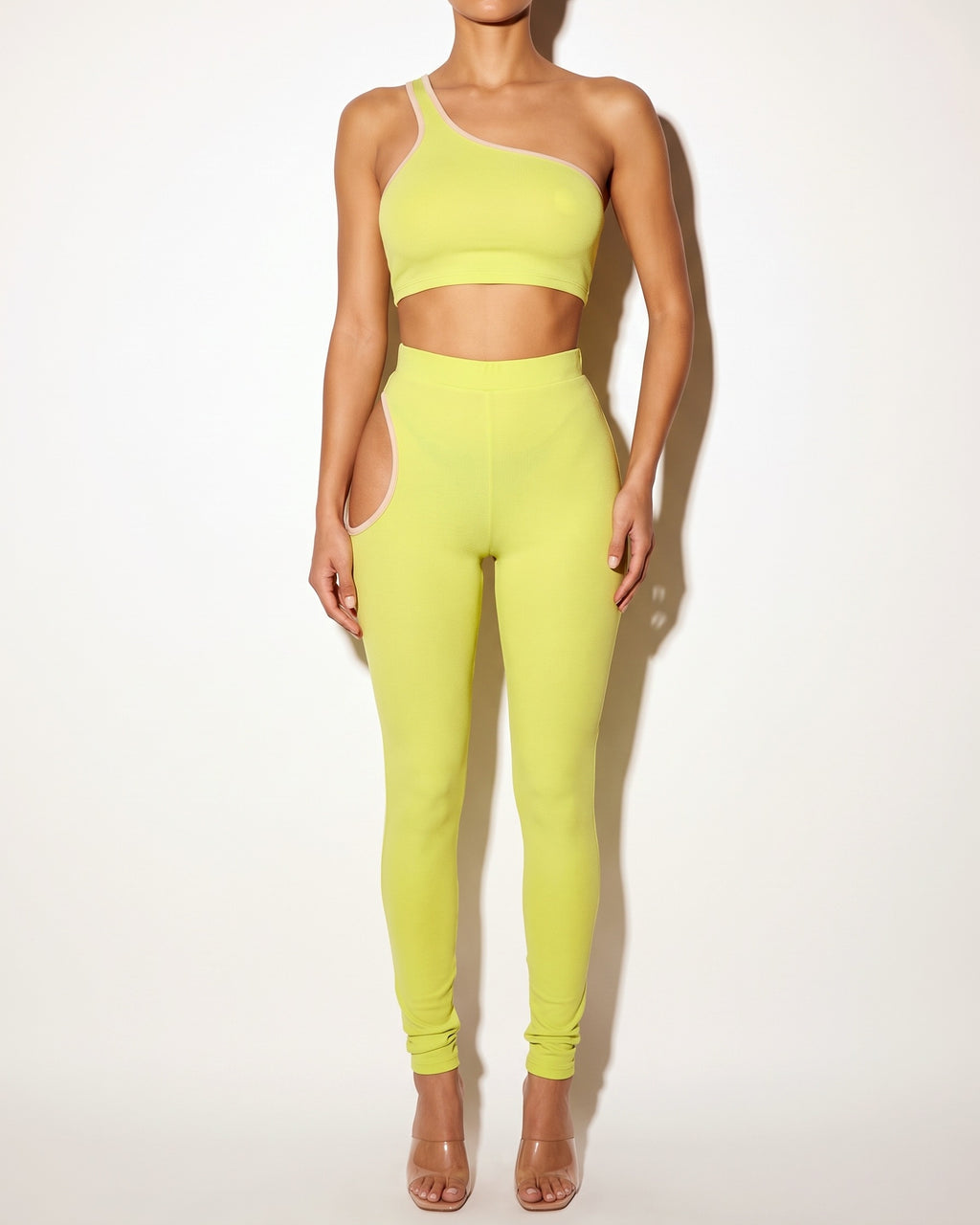 Citrus and nude cutout detailed tank and legging set, alternate front view on model