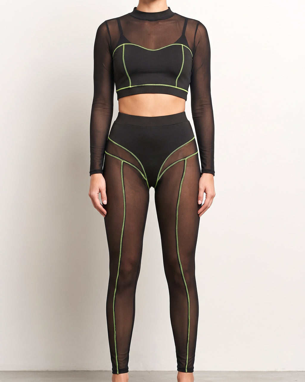 Muvin women's black and neon yel mesh contrast reverse stitch detailed set, front view on model