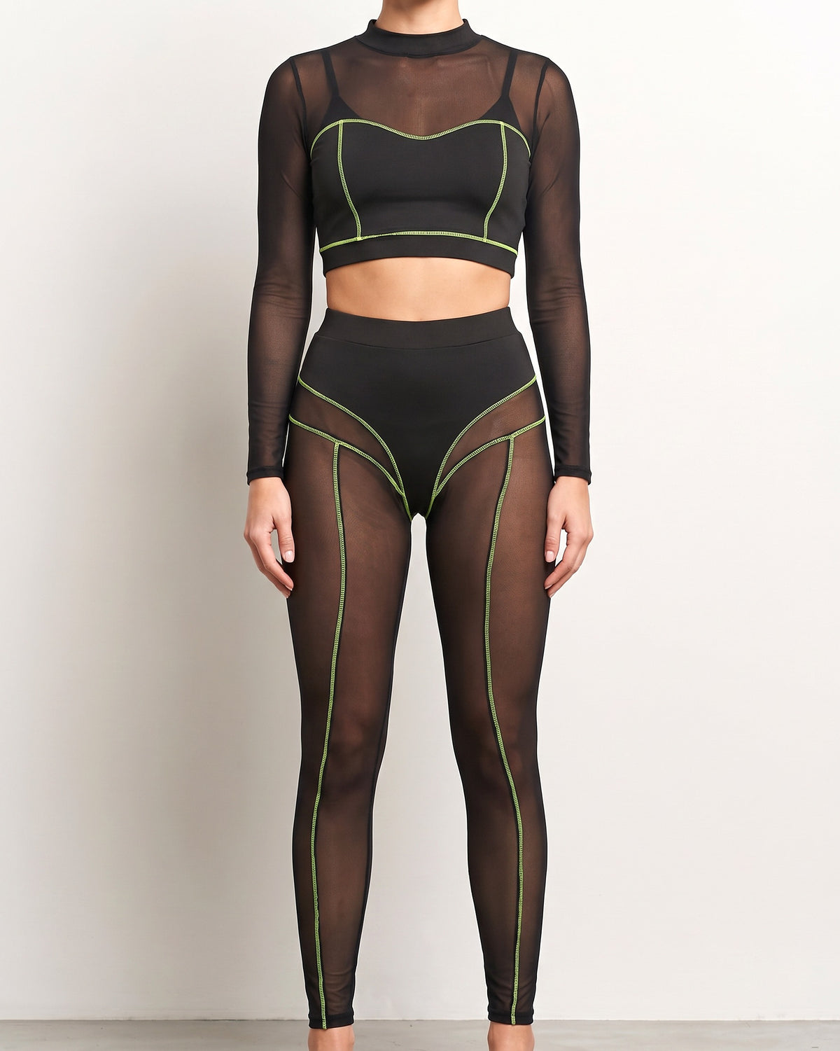 Muvin women's black and neon yel mesh contrast reverse stitch detailed set, front view on model