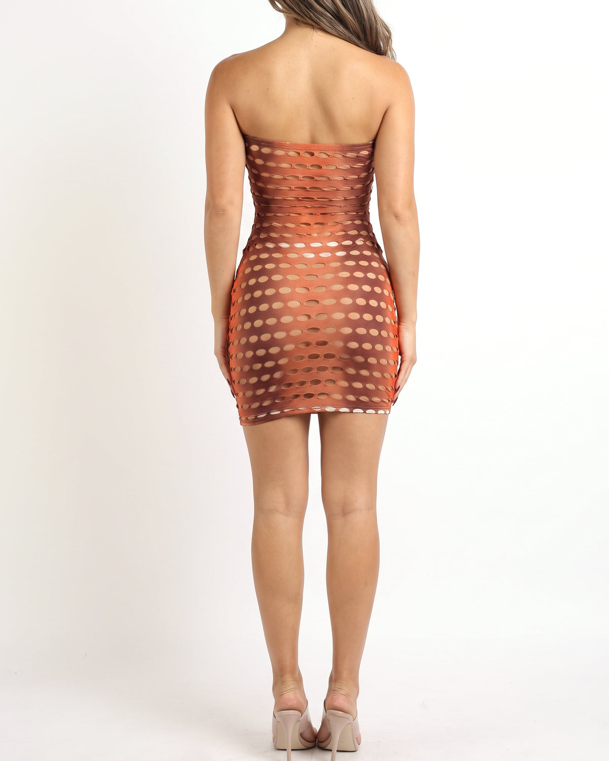 Orange combo hole tube mini dress, back view on model