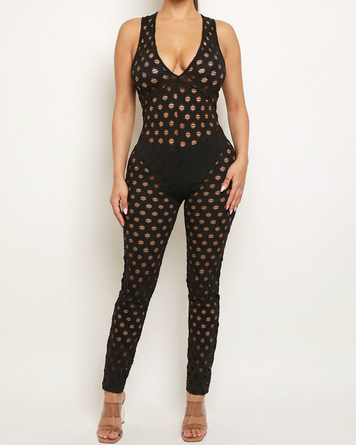 Black all over you mesh jumpsuit, alternate front view on model