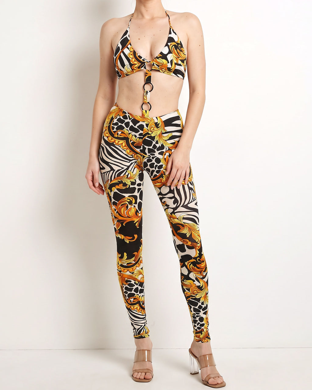 Black yellow o ring detailed halter neck jumpsuit, alternate front view on model