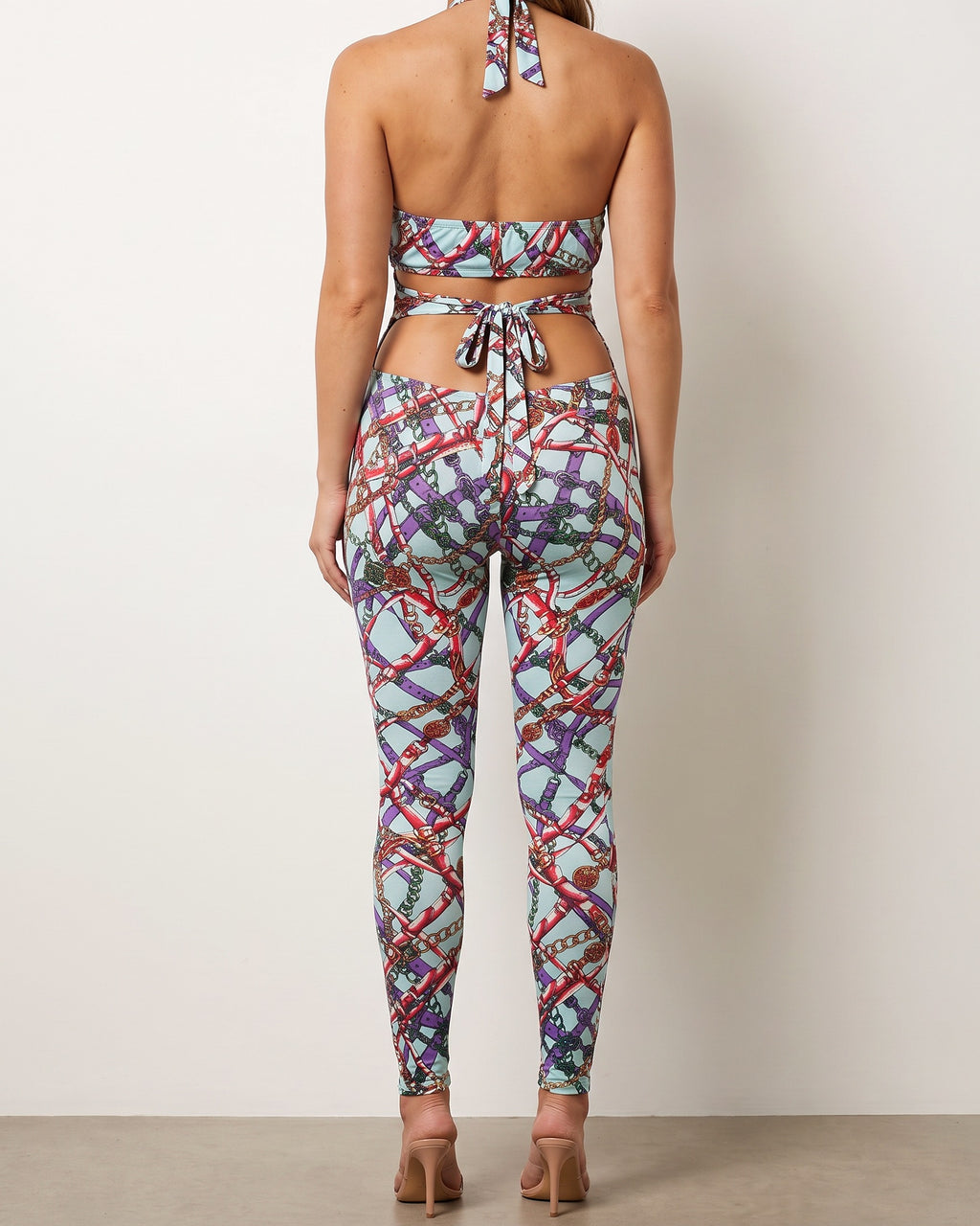 Aqua combo printed tie detailed jumpsuit, back view on model