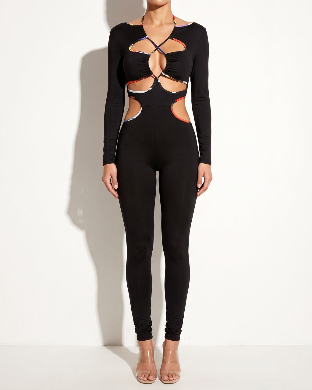 Muvin women's black rainbow binding detailed cut out jumpsuit, front view on model