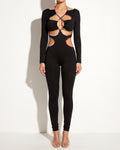 Muvin women's black rainbow binding detailed cut out jumpsuit, front view on model