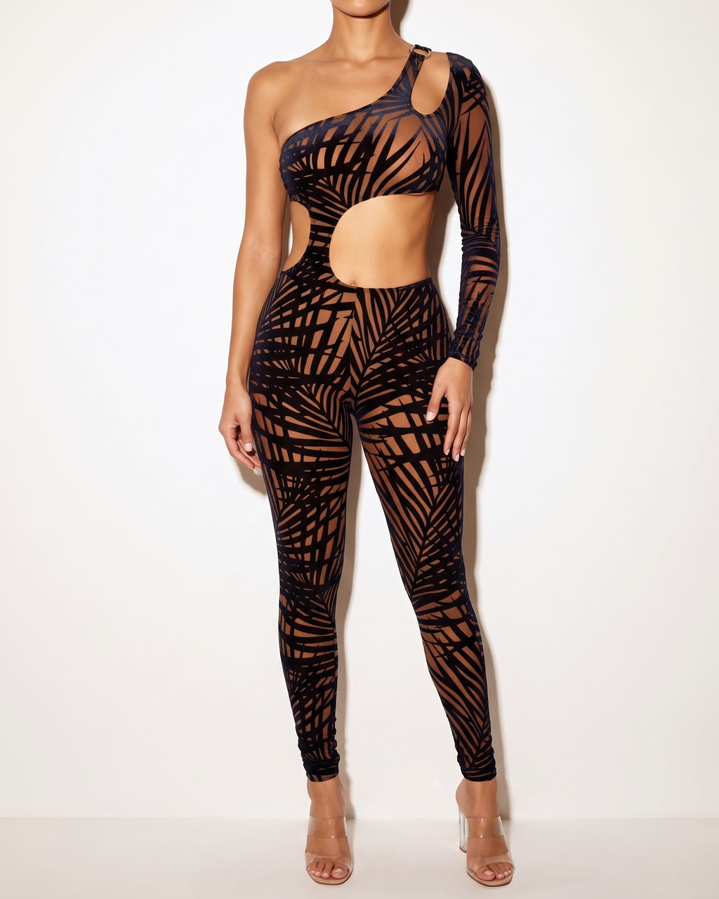 Mocha and navy tropical leaf silhouette one sleeve jumpsuit, alternate front view on model