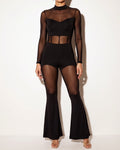 Muvin women's black mesh color block flared pants jumpsuit, front view on model