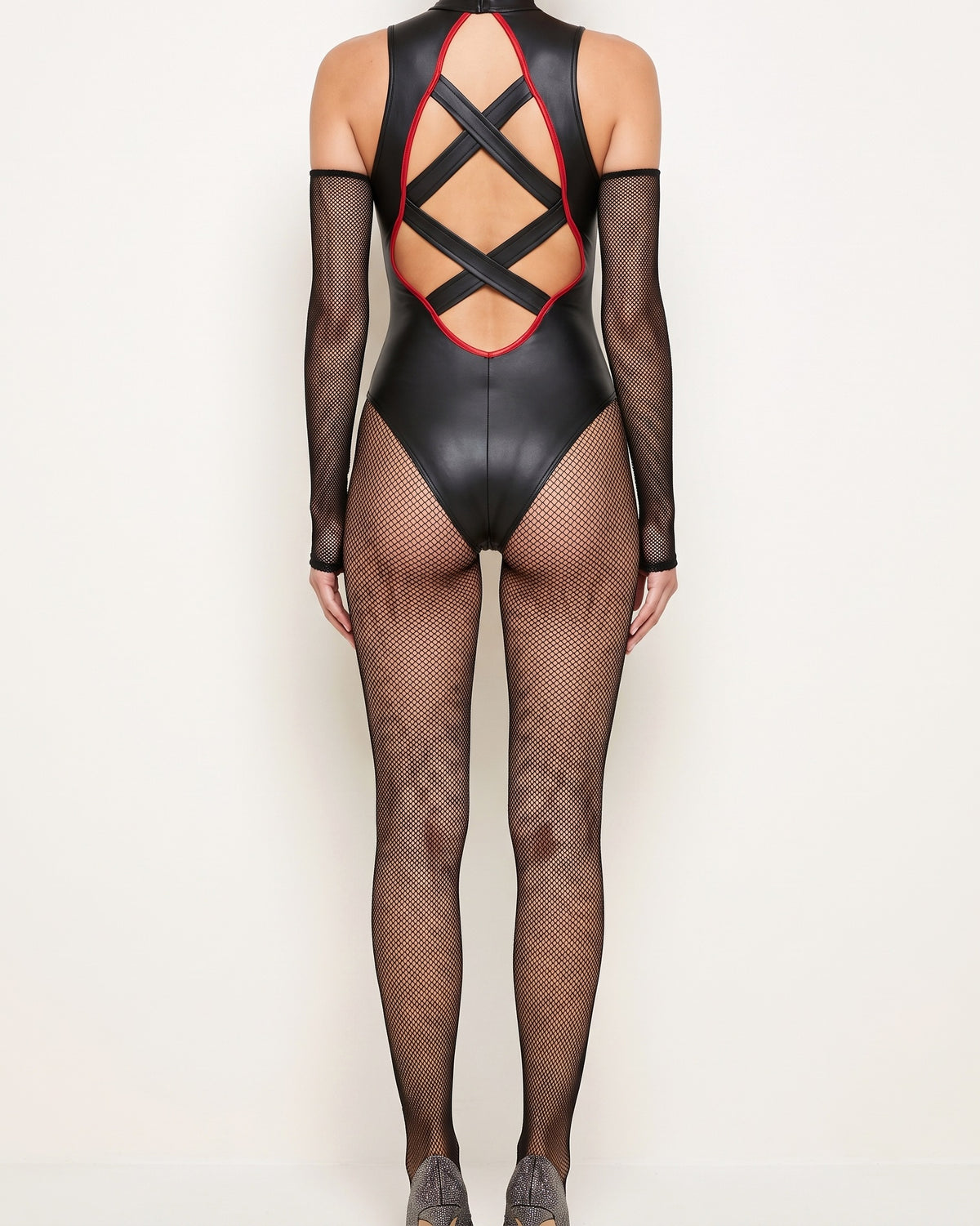 Black and red cutout halter mesh off shoulder jumpsuit, back view on model
