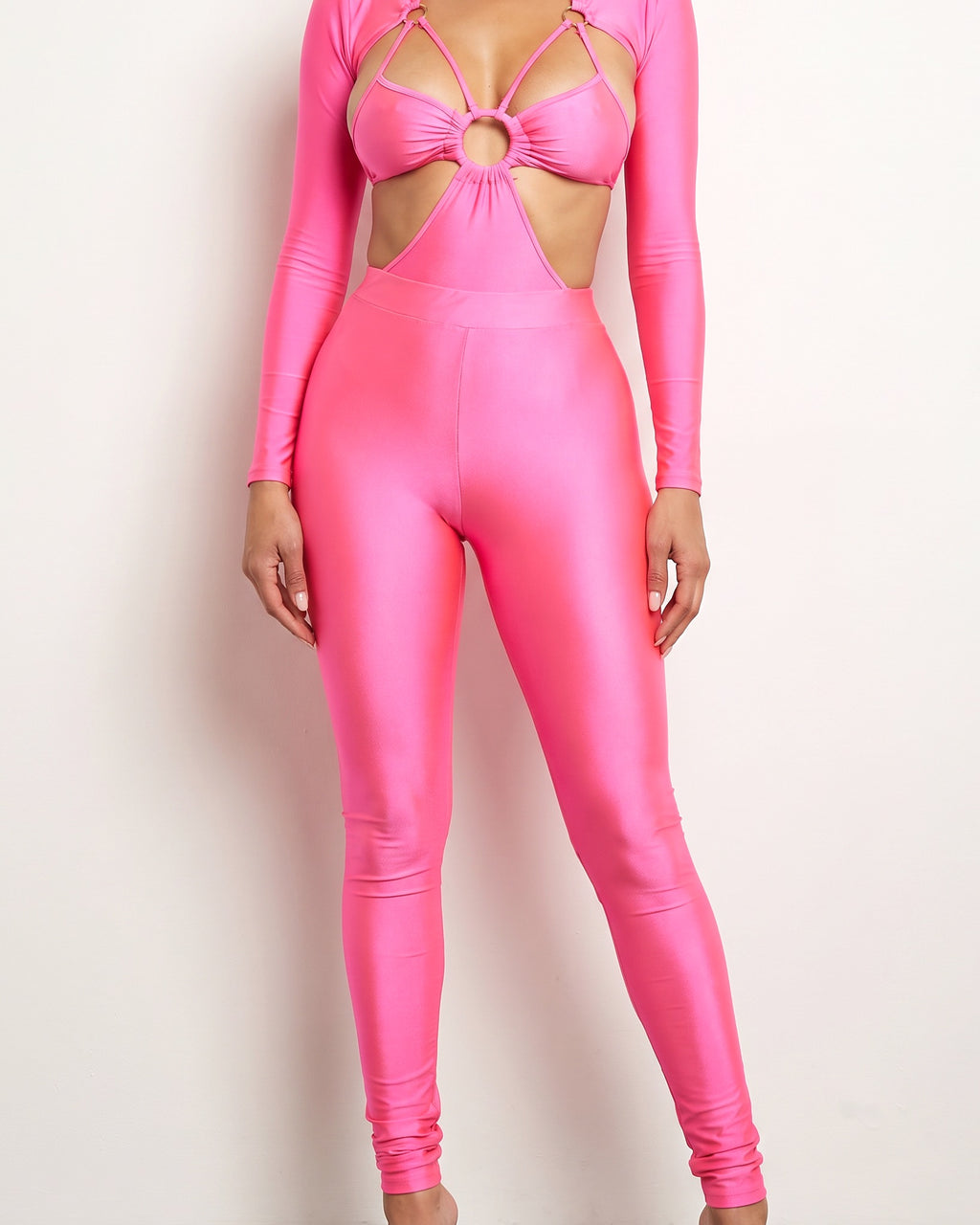Muvin women's neon pink cutout detailed bodysuit and leggings set, front view on model
