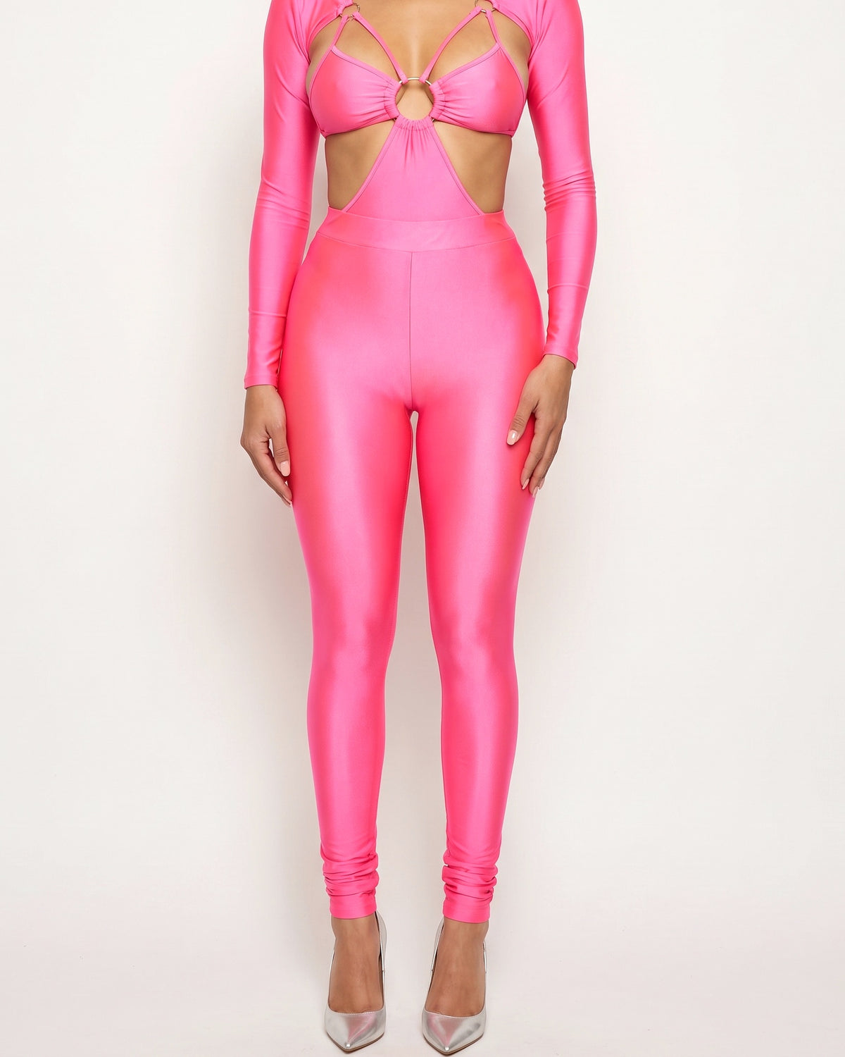 Neon pink cutout detailed bodysuit and leggings set, alternate front view on model