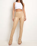 Muvin women's nude over heel matte PU leggings, front view on model