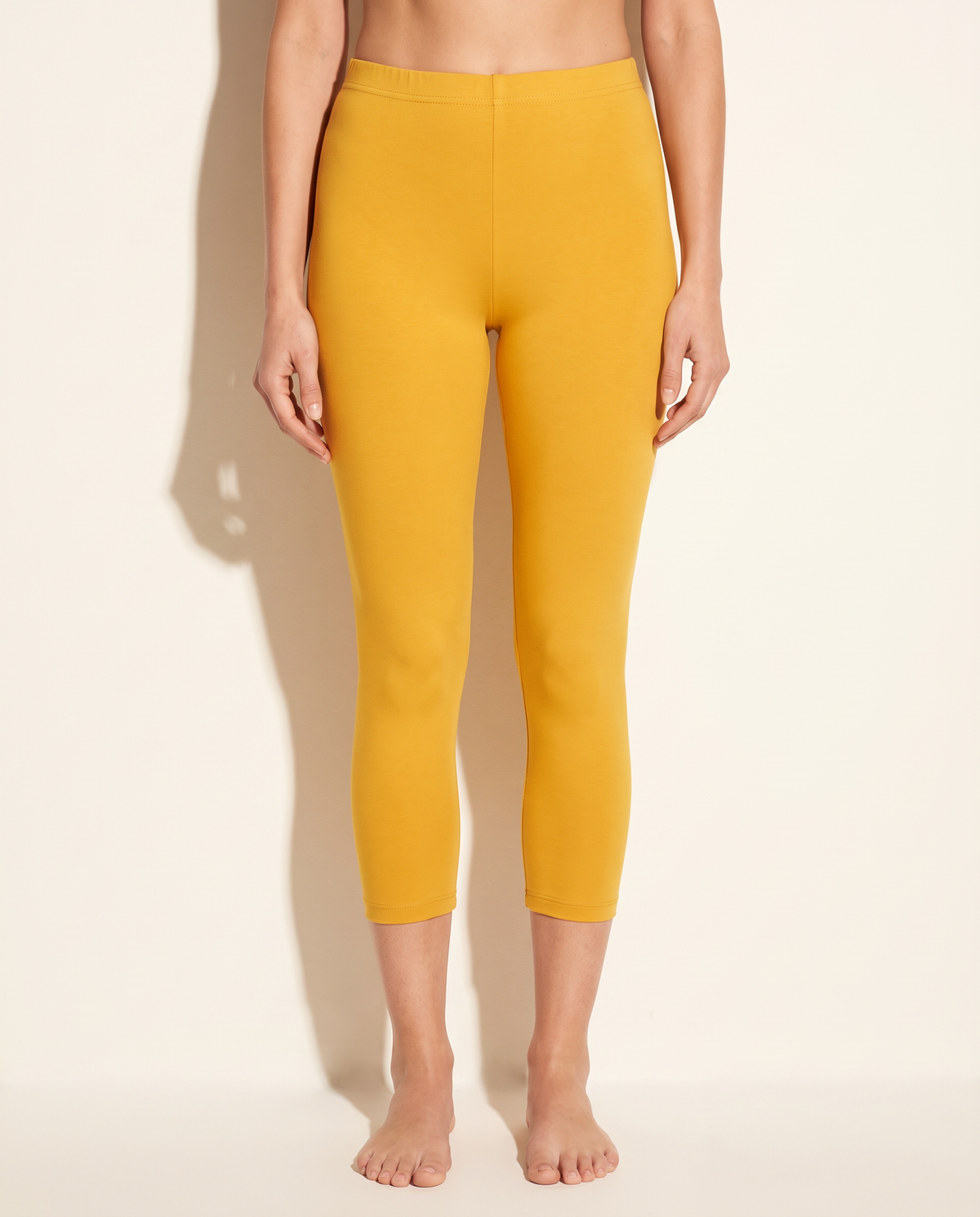 Elevated Basic Solid Capri Leggings in Mustard — front view