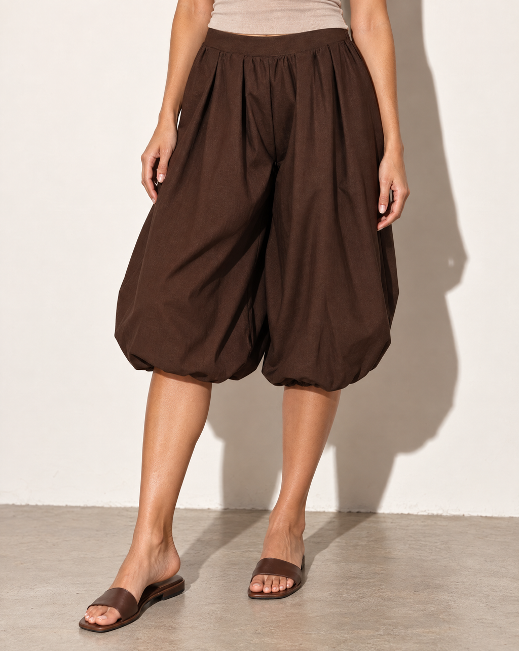 Wide Bubble Hem Capri Pants in Brown — alternate front view