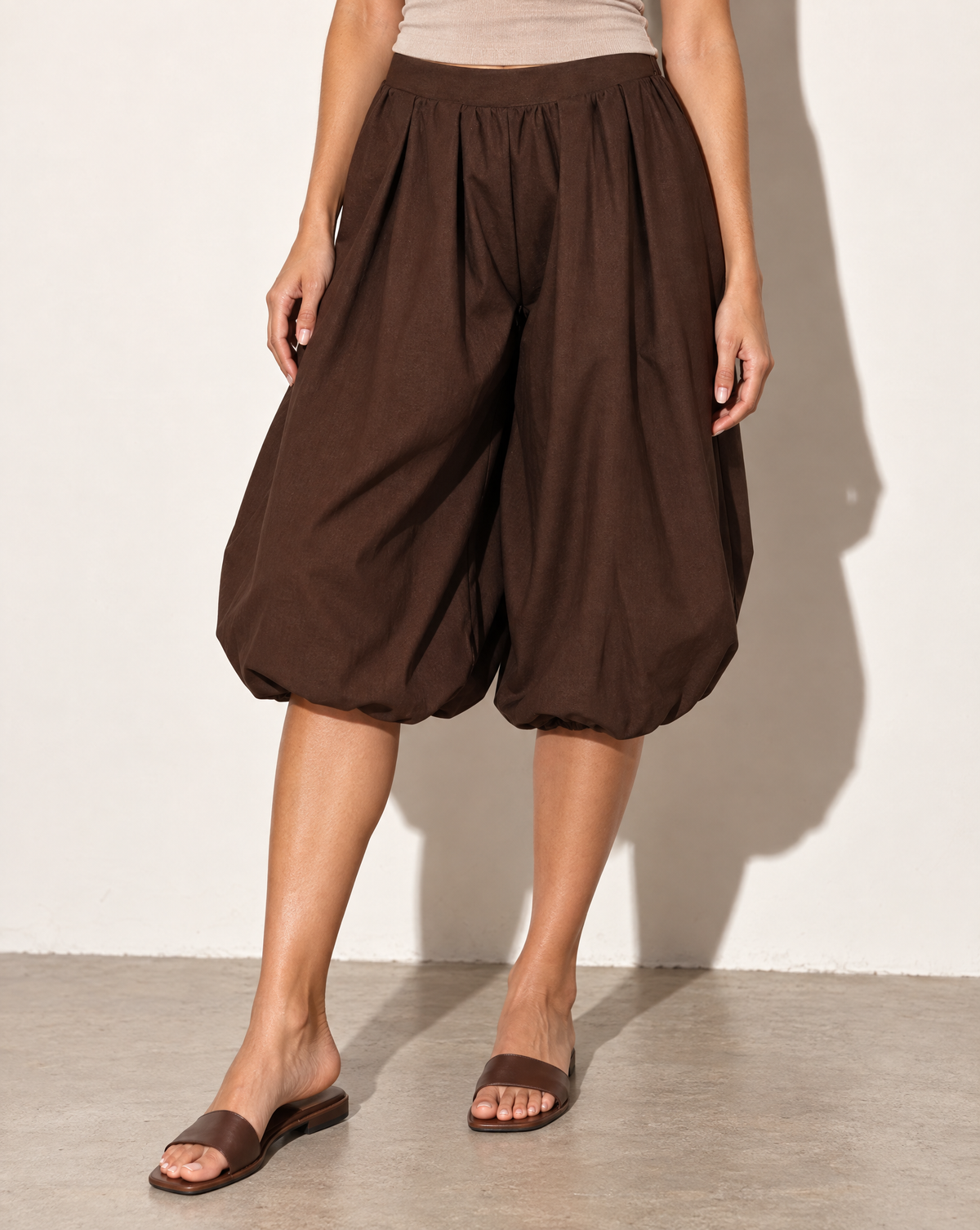 Wide Bubble Hem Capri Pants in Brown — alternate front view