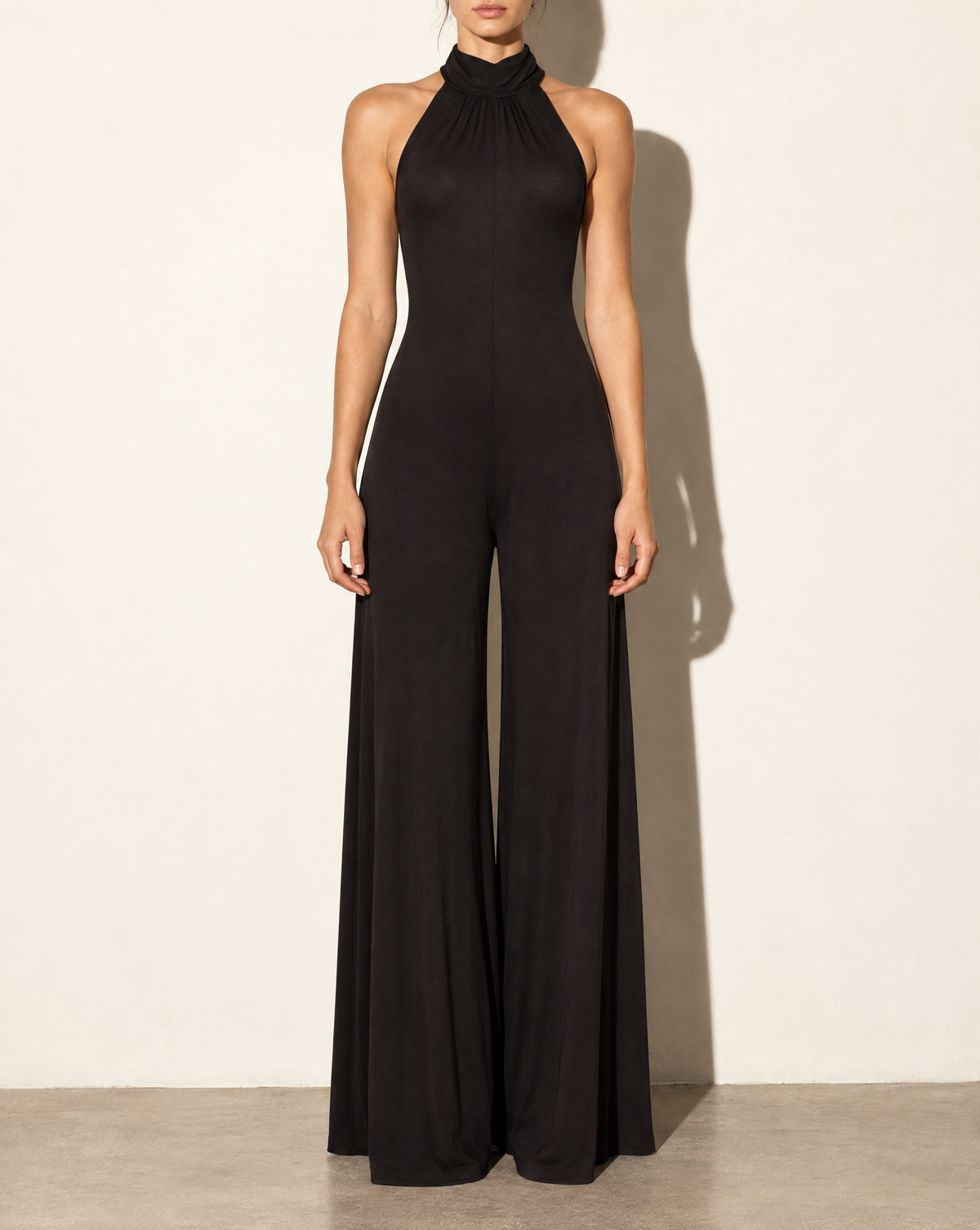 Halter Open Back Wide Leg Jumpsuit in Black — front view