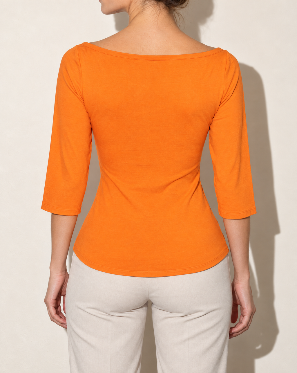 Boat Neck Three-Quarter Sleeve Top in Orange — back view