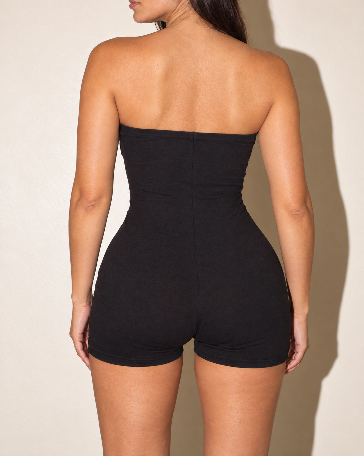Elevated Basic Tube Romper in Black — back view