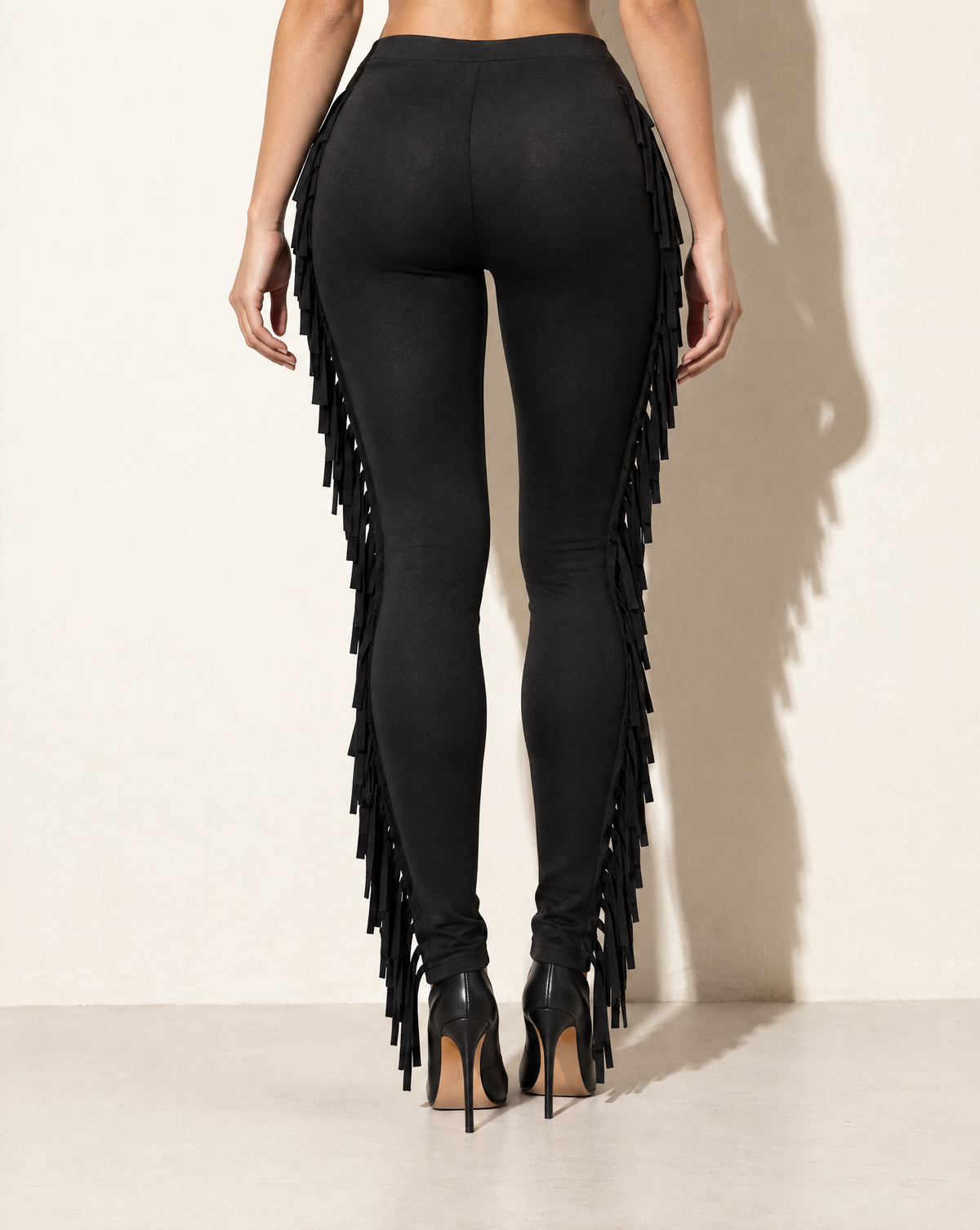 Lace Up Detailed Fringe Pants in Black — back view