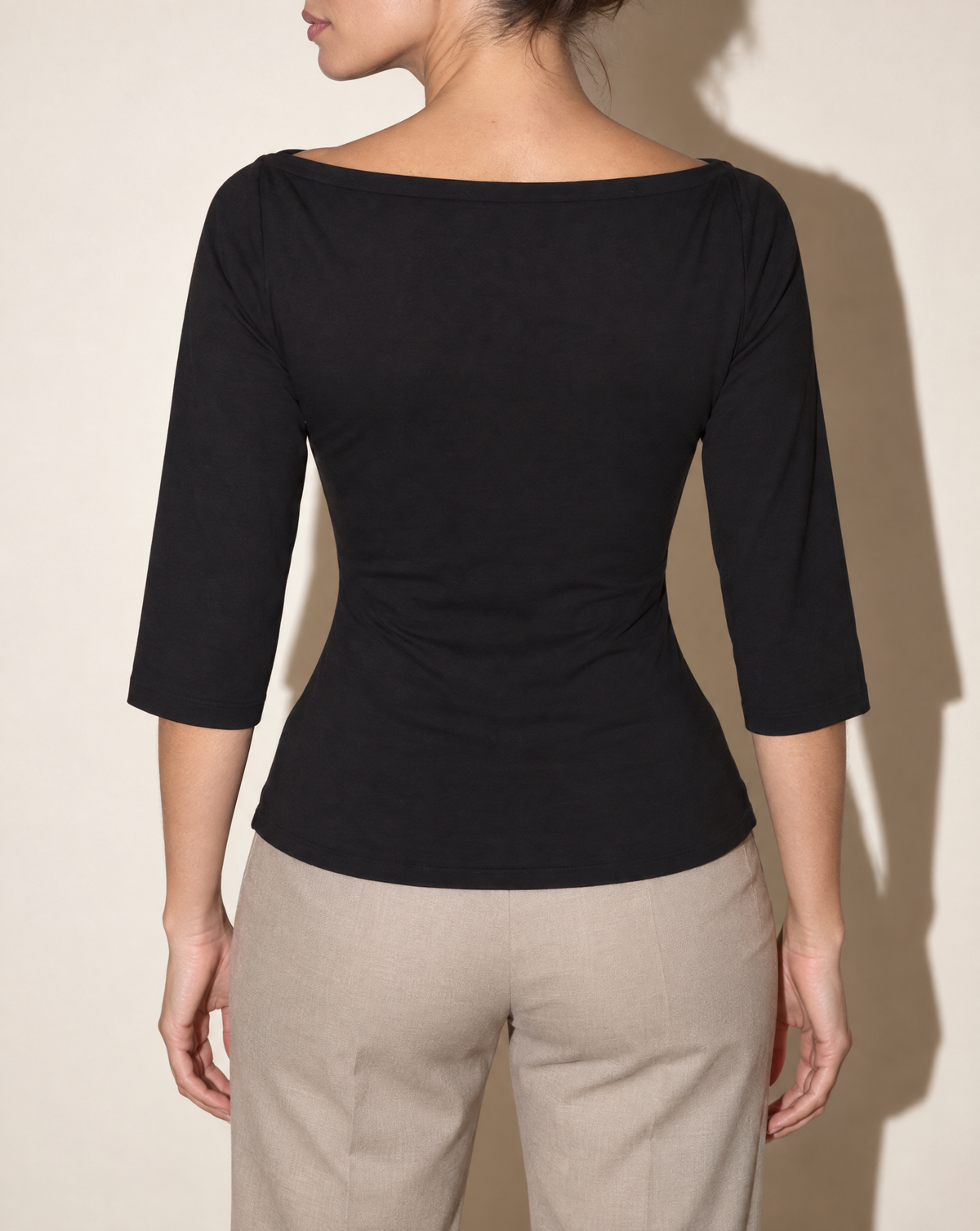 Boat Neck Three-Quarter Sleeve Top in Black — back view