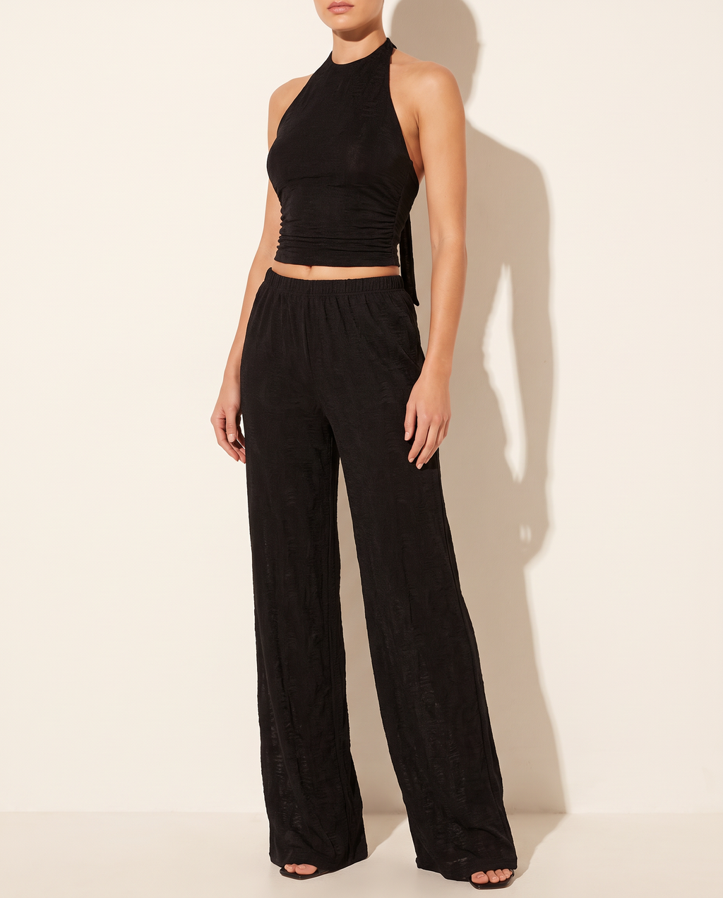 Halter Crop Top & Wide Leg Pants Set in Black — alternate front view