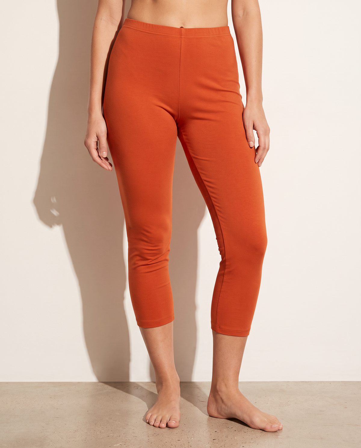 Elevated Basic Solid Capri Leggings in Rust — alternate front view