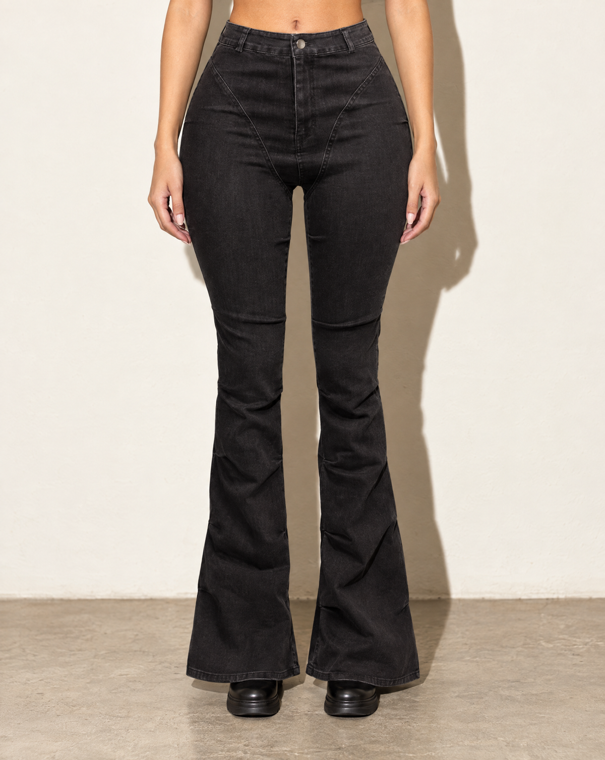 Pinched Bell Bottom Denim Pants in Black — front view