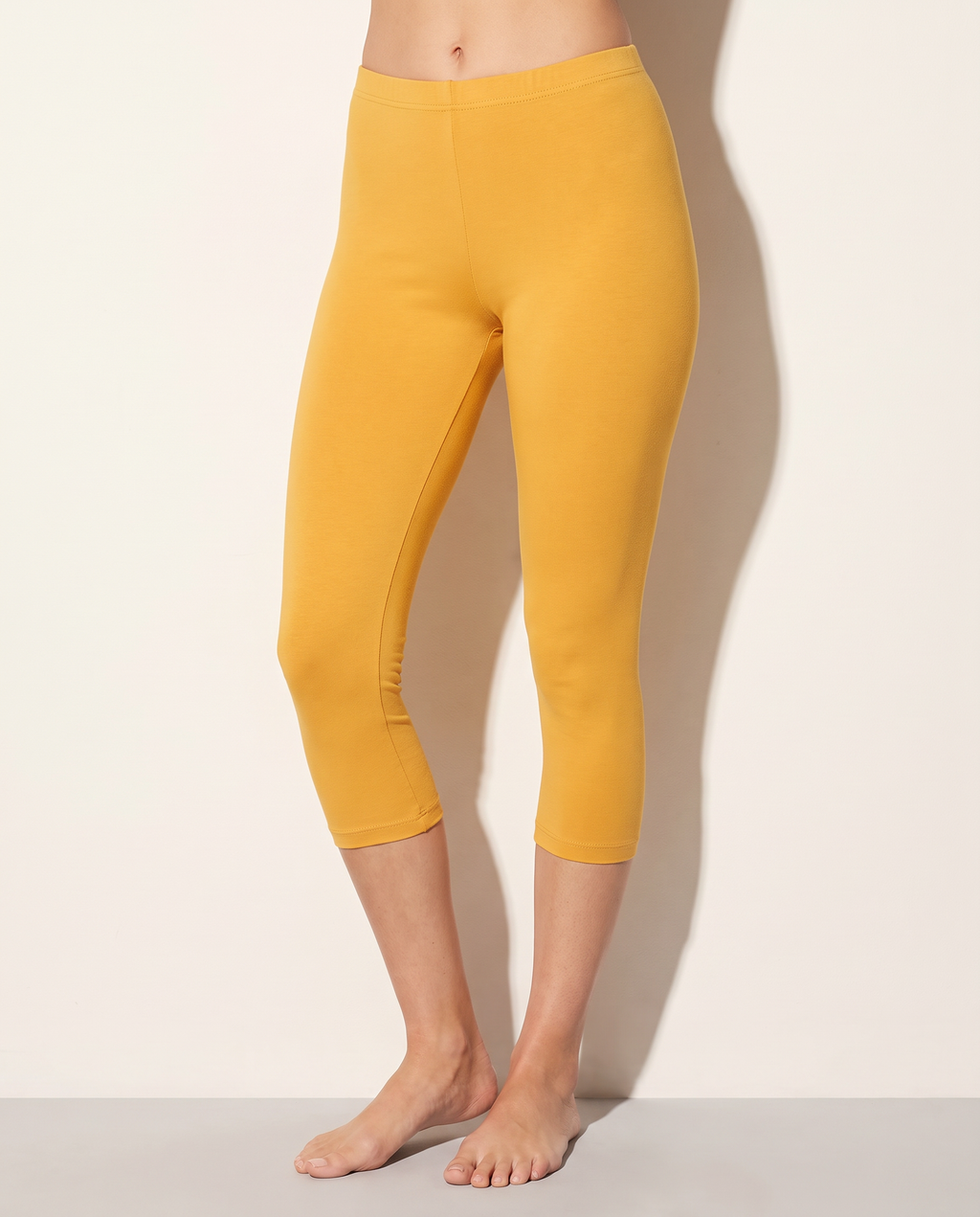 Elevated Basic Solid Capri Leggings in Mustard — alternate front view