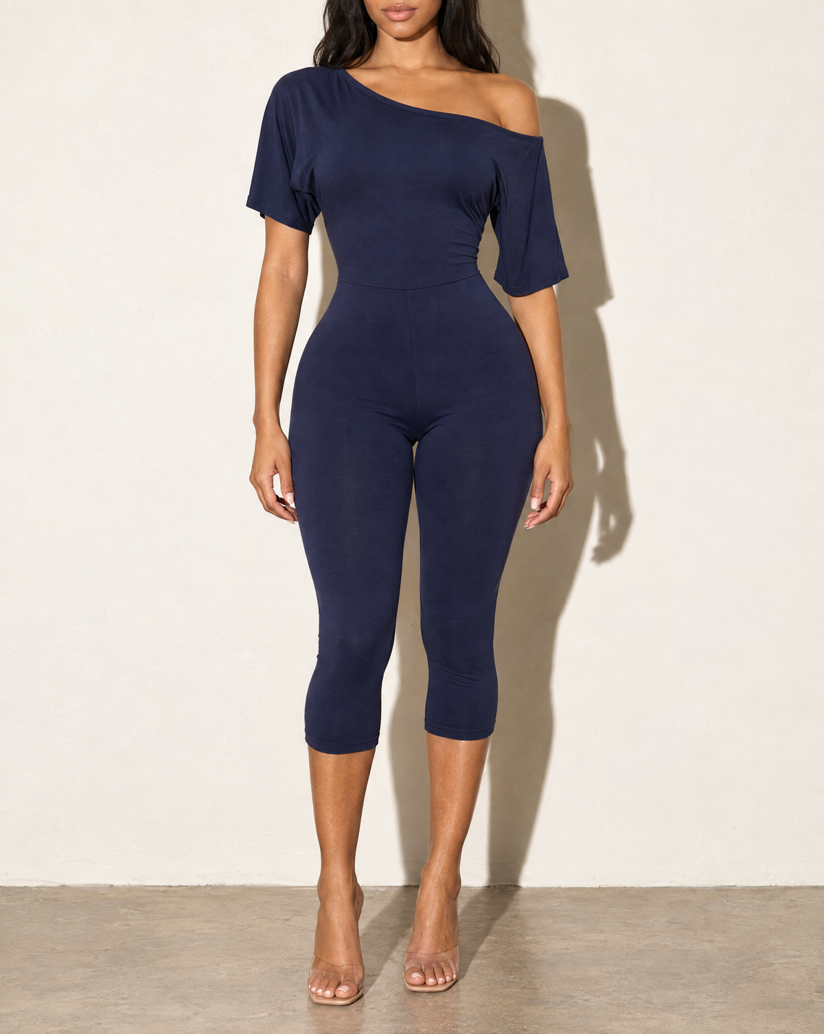 One Off Shoulder Capri Jumpsuit in Navy — front view