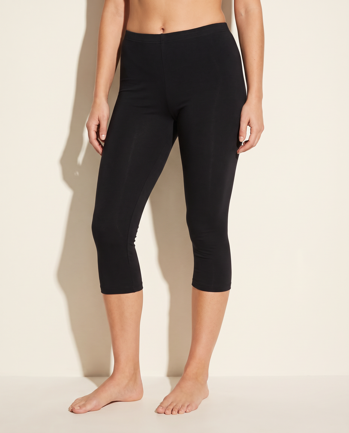 Elevated Basic Solid Capri Leggings in Black — alternate front view