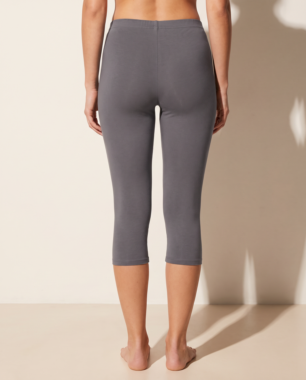 Elevated Basic Solid Capri Leggings in CEMENT — back view