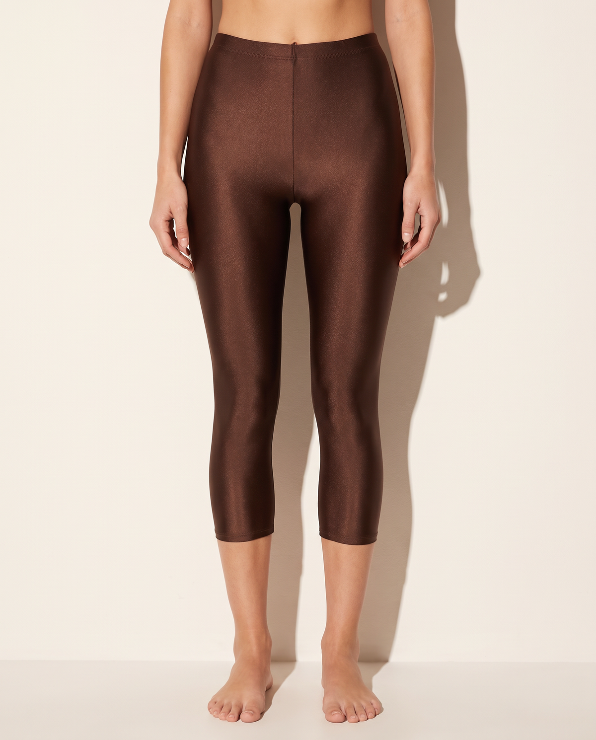 Nylon Capri Leggings in Brown — front view