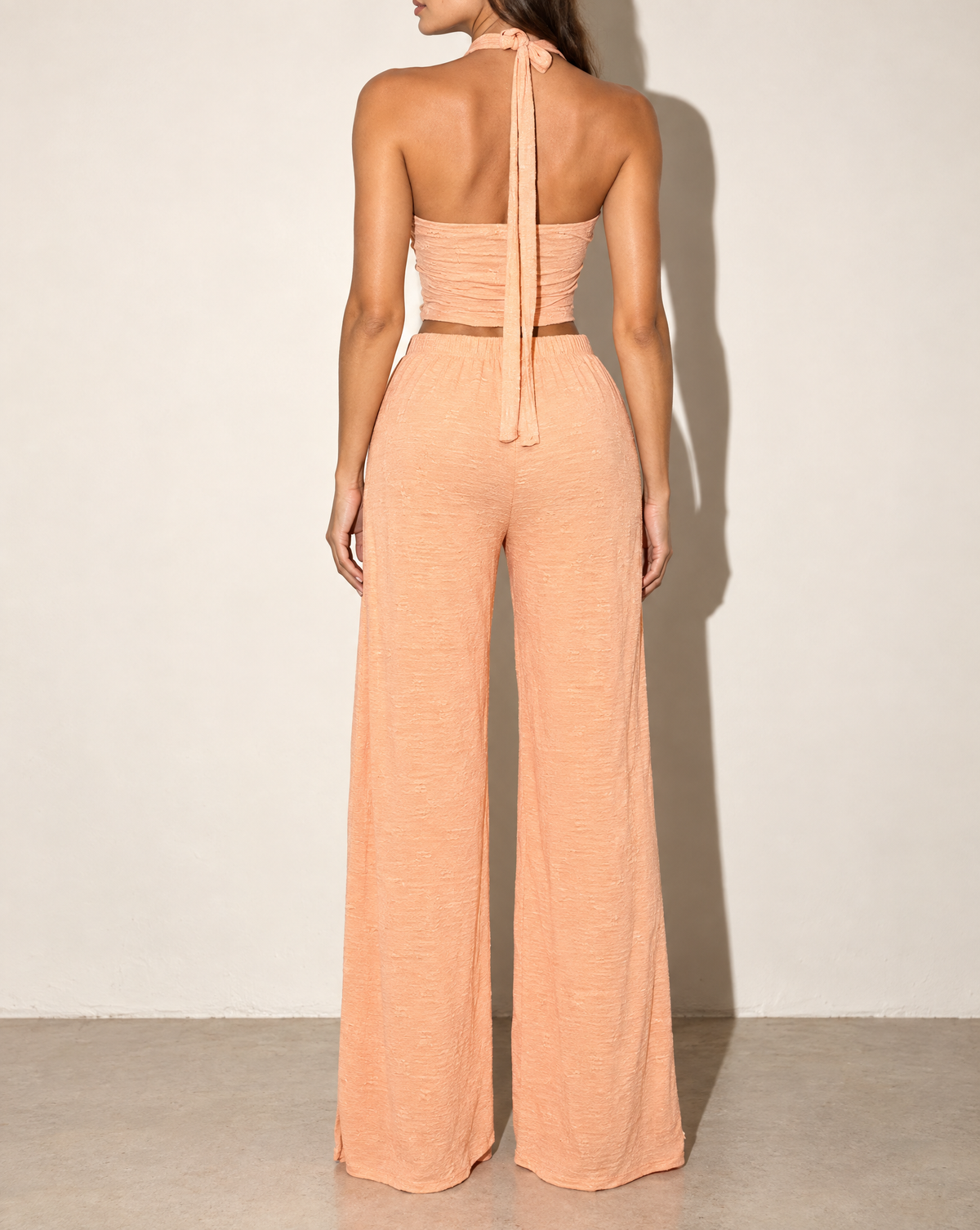 Halter Crop Top & Wide Leg Pants Set in PEACH FUZZ — back view