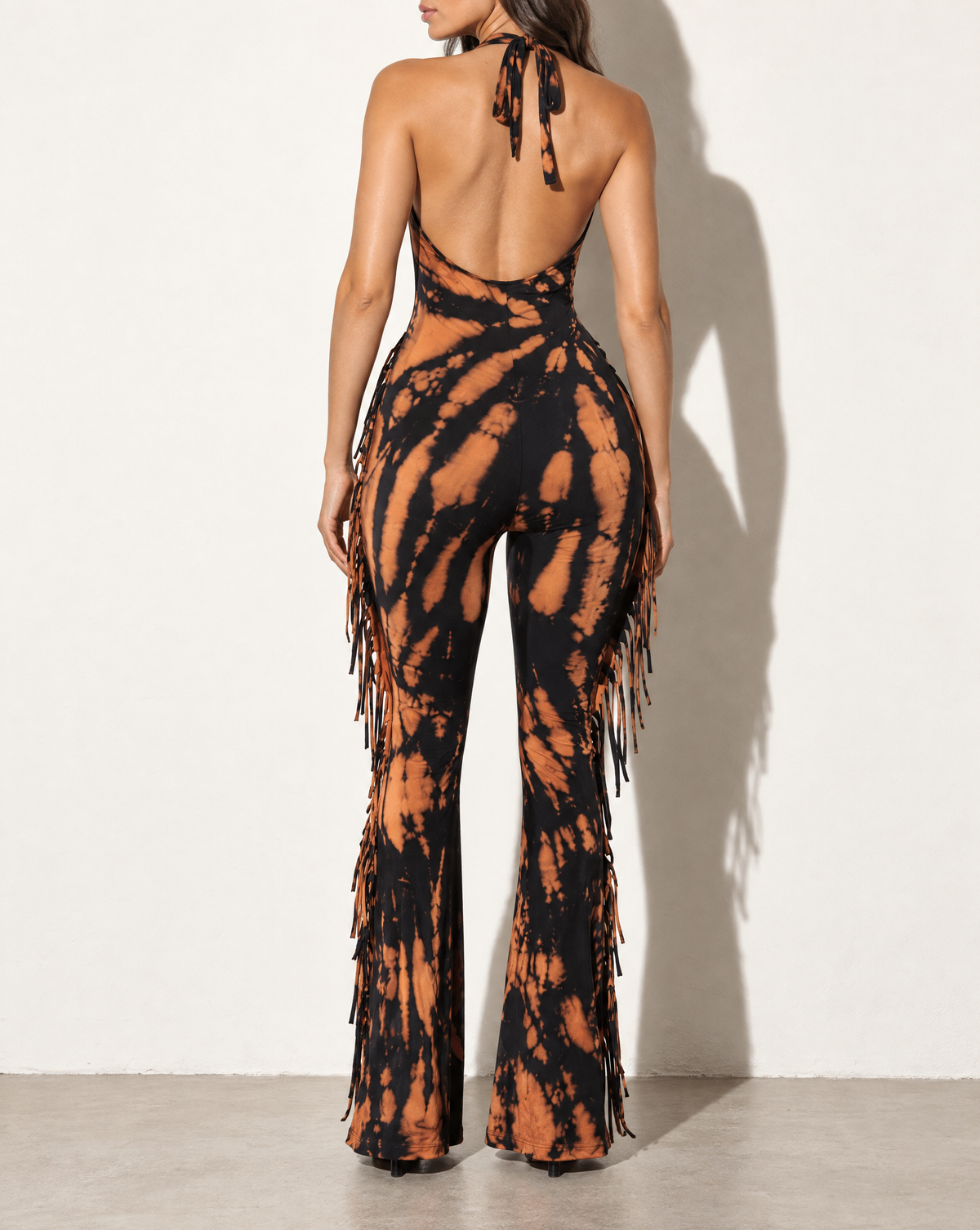 Tie Dye Fringed Halter Jumpsuit in BLACK/RUST — back view