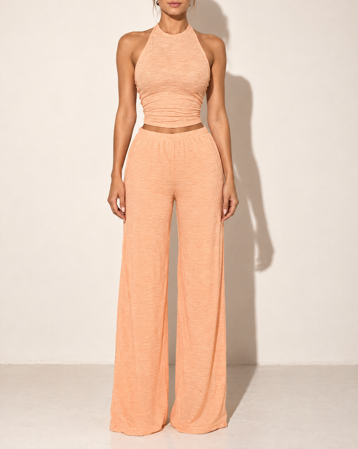 Halter Crop Top & Wide Leg Pants Set in PEACH FUZZ — front view