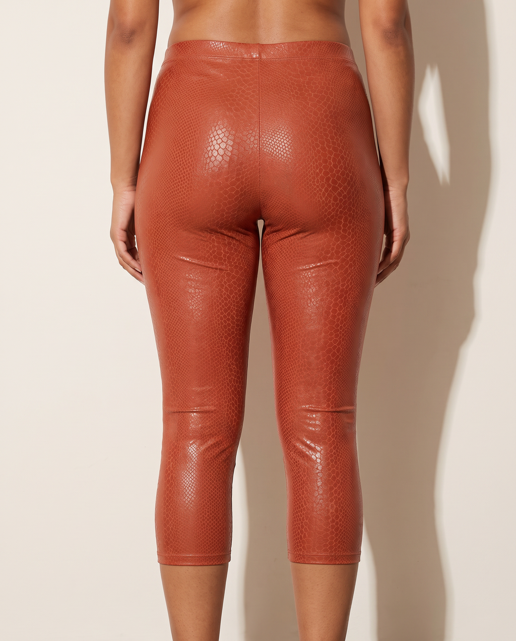 Capri Leggings in Rust — back view