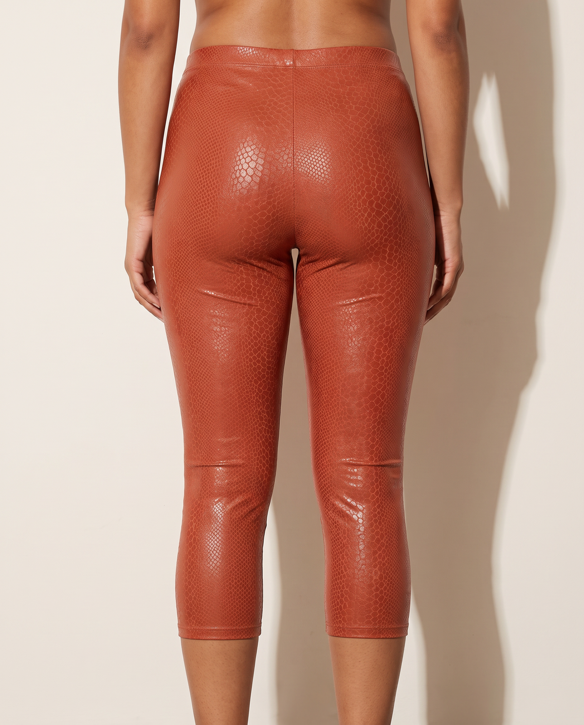 Capri Leggings in Rust — back view