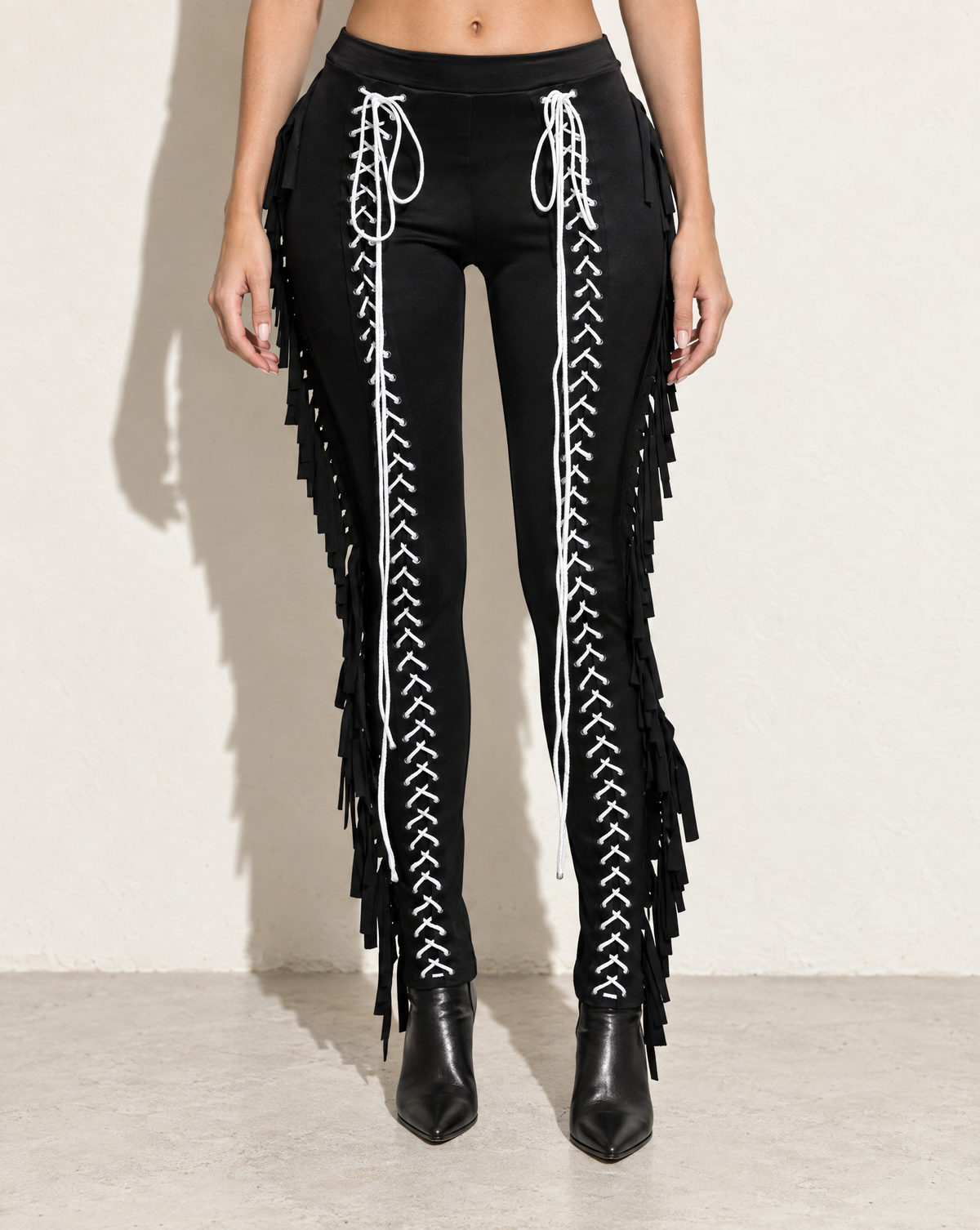 Lace Up Detailed Fringe Pants in Black — front view