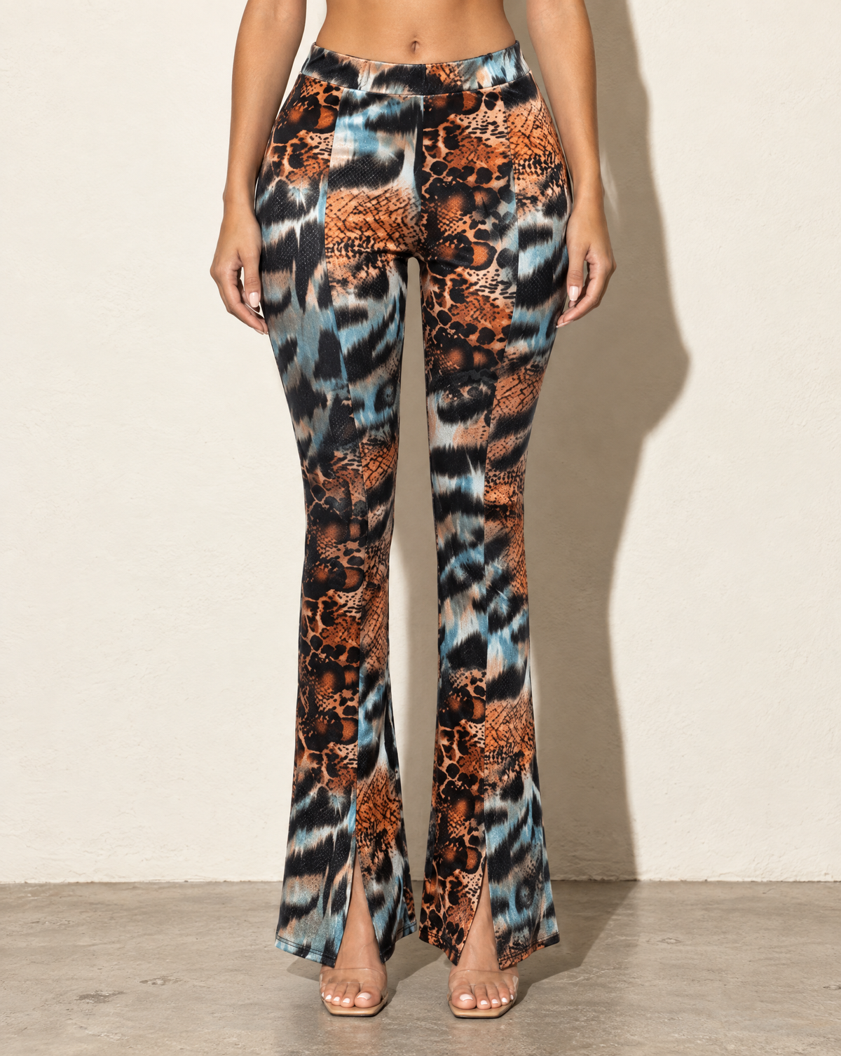 Foiled Animal Printed Slit Hem Flared Pants in RUST COMBO — front view